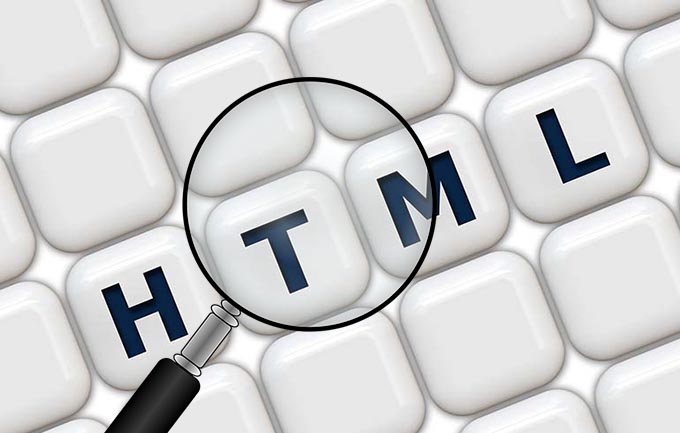 the word html with a magnifying glass over it